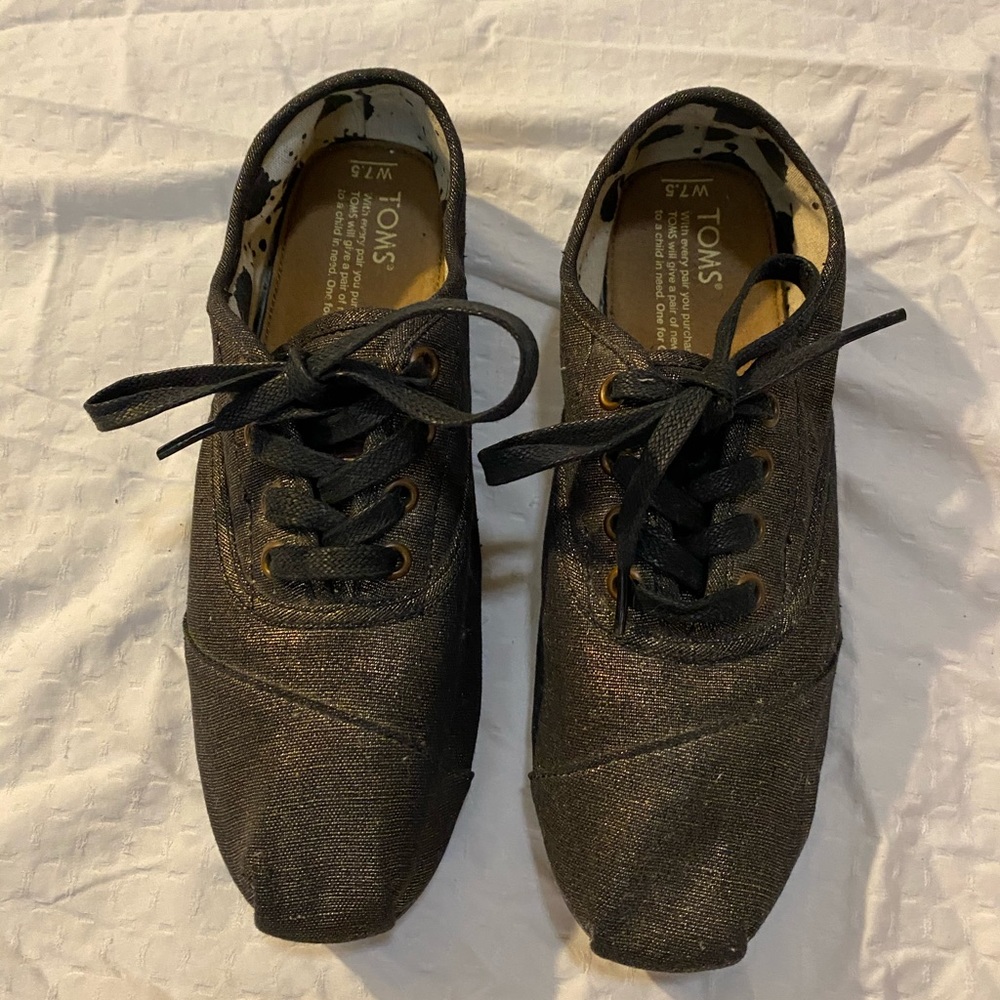 Toms- Black and gold lace up shoes